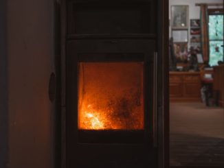 Warm and inviting fireplace in a cozy Austrian living room setting.